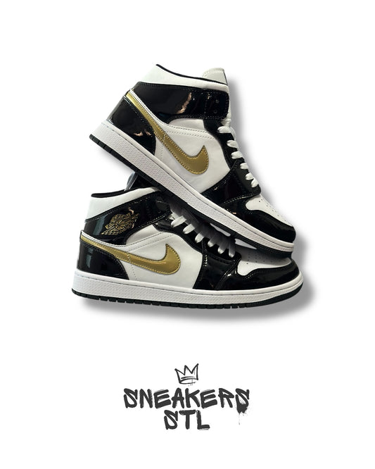 JORDAN 1 MID PATENT BLACK GOLD